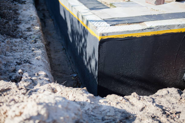 Professional Emergency Waterproofing technician working in Bridgeport, NY